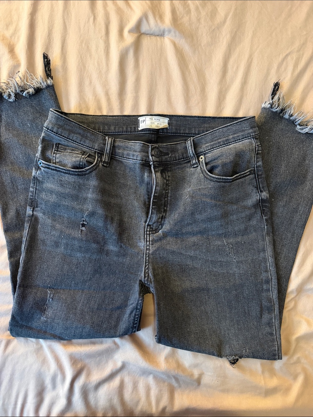 Free People Denim High Straight Crop Jeans in Washed Black with frayed bottom